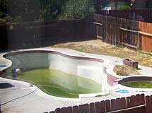 Abandoned pool with mosquitos.