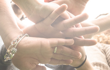 Photo of helping hands.