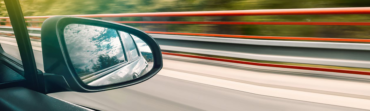 looking out a car window.